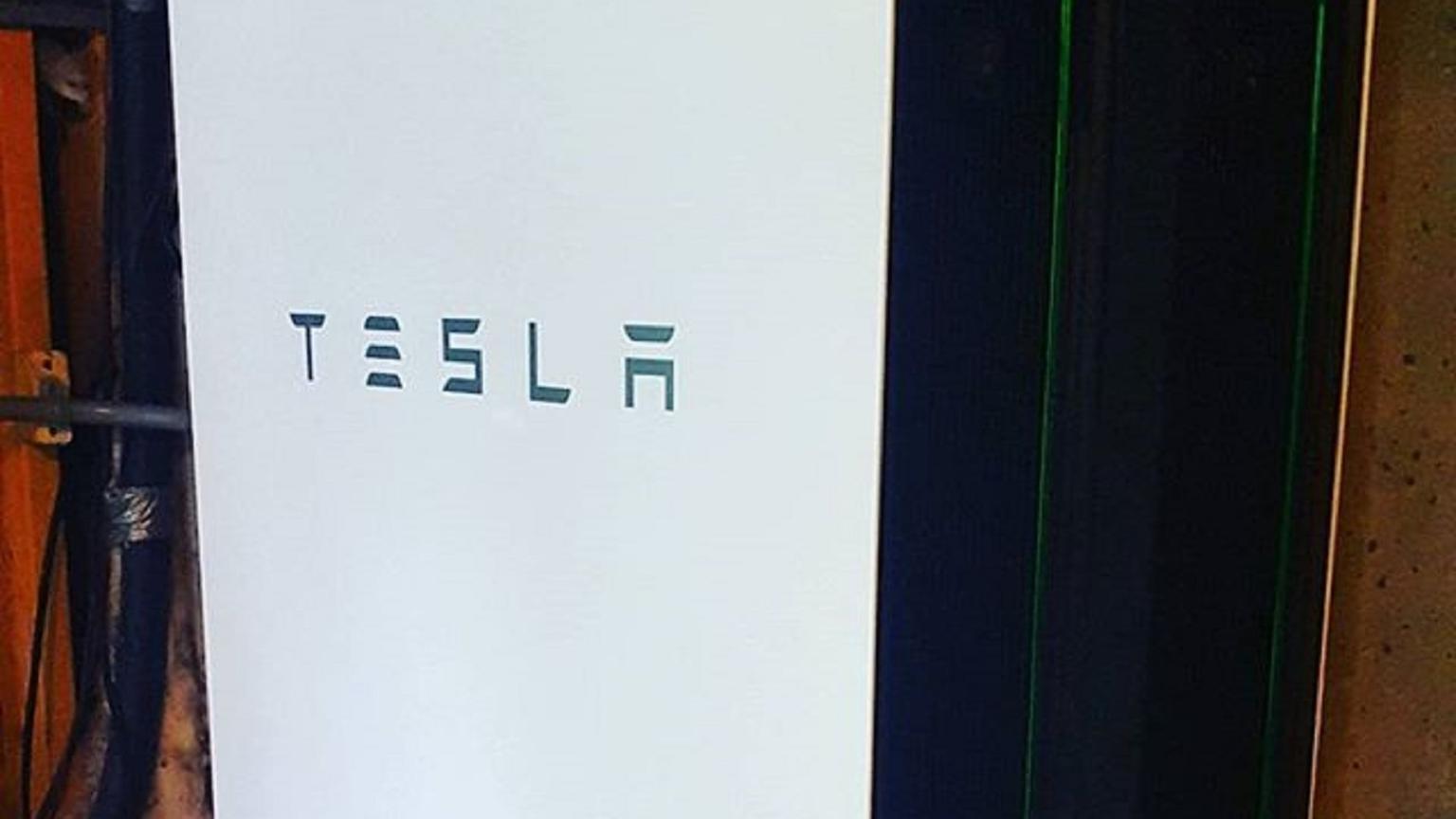 Two Tesla Powerwall batteries installed side by side in a home in upstate New York