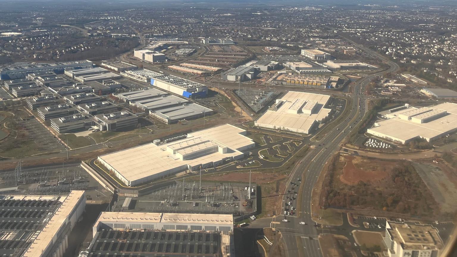 Aerial view of data centers, electrical substations and other commercial buildings near Ashburn, Virginia