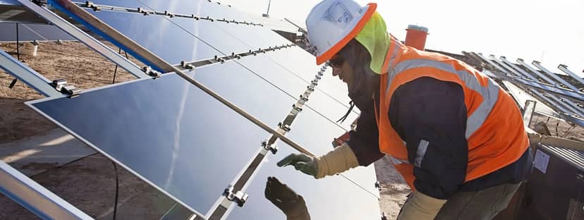 Technician servicing photovoltaic modules at Agua Caliente Solar Project